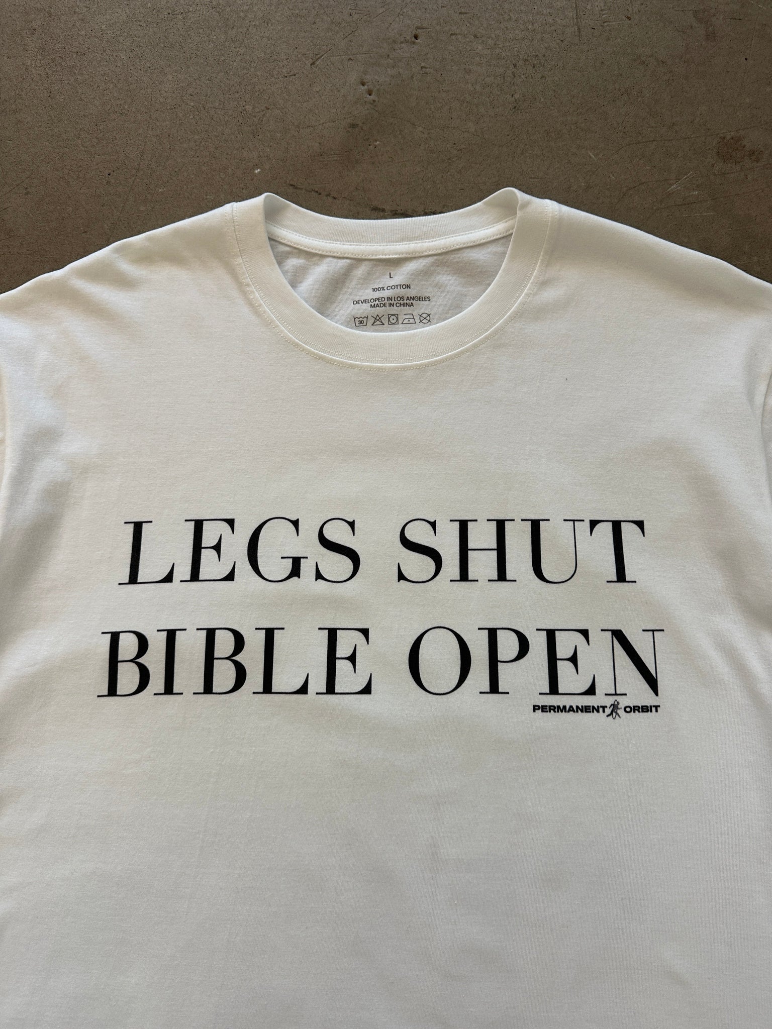 Permanent Orbit Legs Shut Bible Open T-Shirt - White