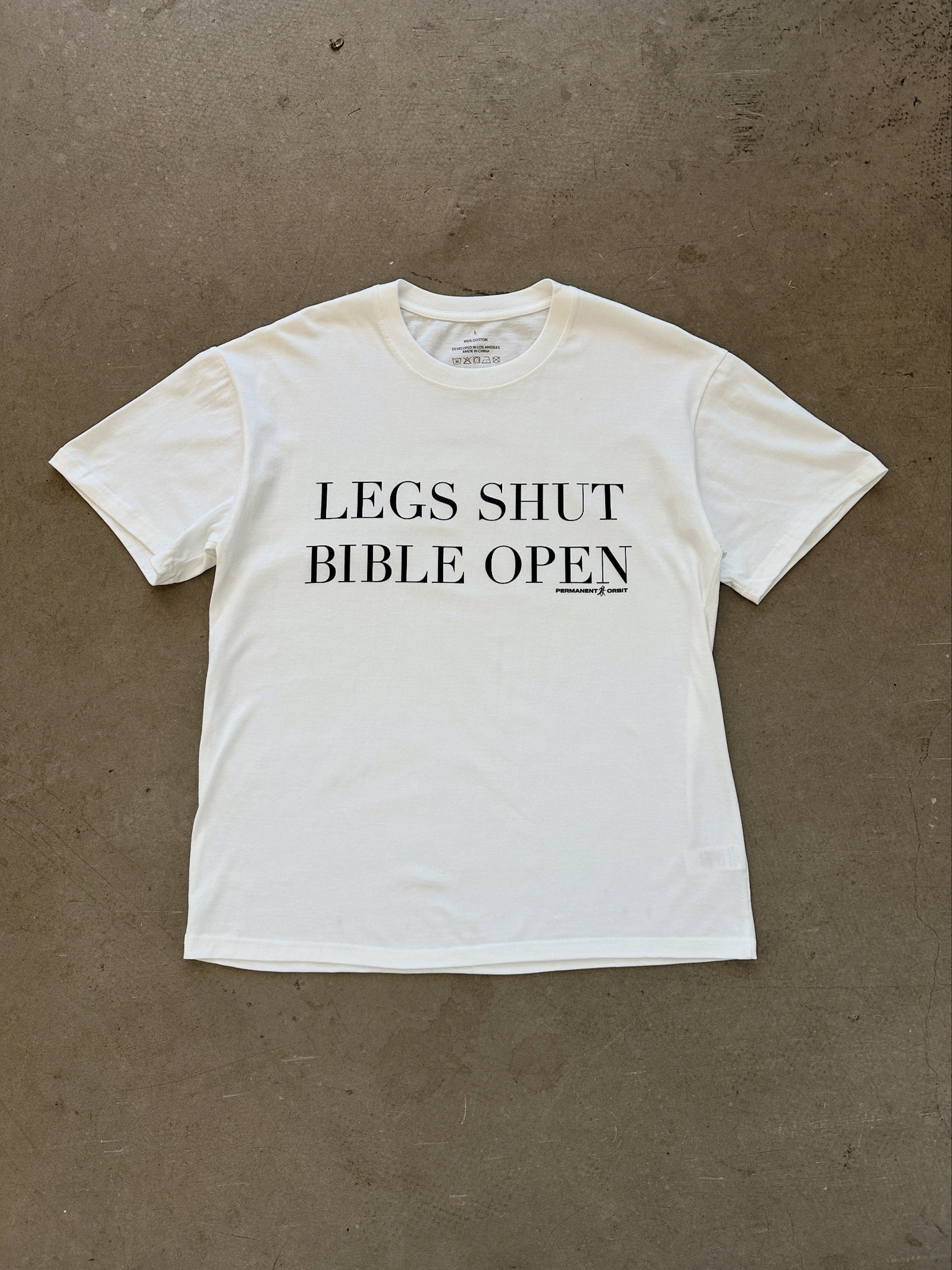 Permanent Orbit Legs Shut Bible Open T-Shirt - White